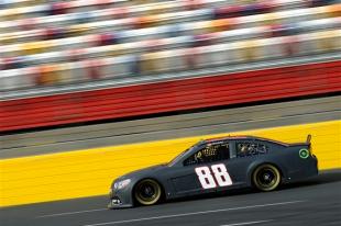 Dale Earnhardt Jr. drives the #88 National Guard Chevrolet during testing at Charlotte Motor Speedway on December 11, 2012 in Concord, North Carolina. (Jared C. Tilton/Getty Images)